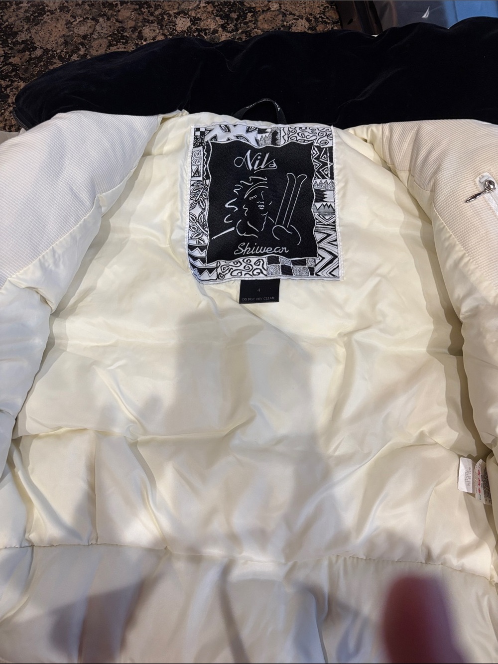 NILS Skiwear Cream Jacket with Black Logo Patch
